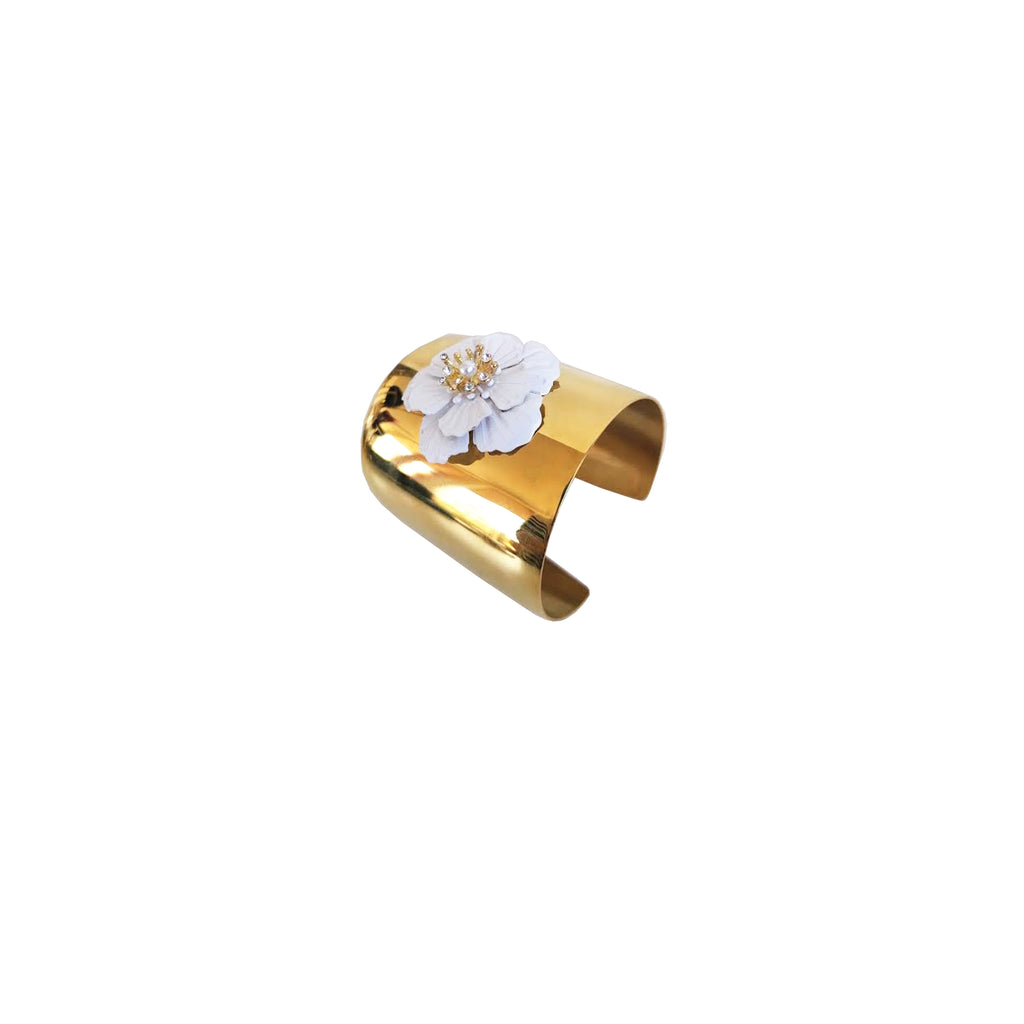 Gold cuff with white flower